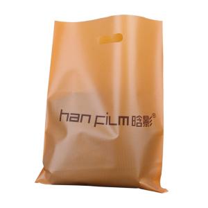 Reusable plastic die cut patch handle shopping carrier bags