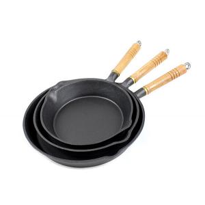 cast iron skillet with wooden handle